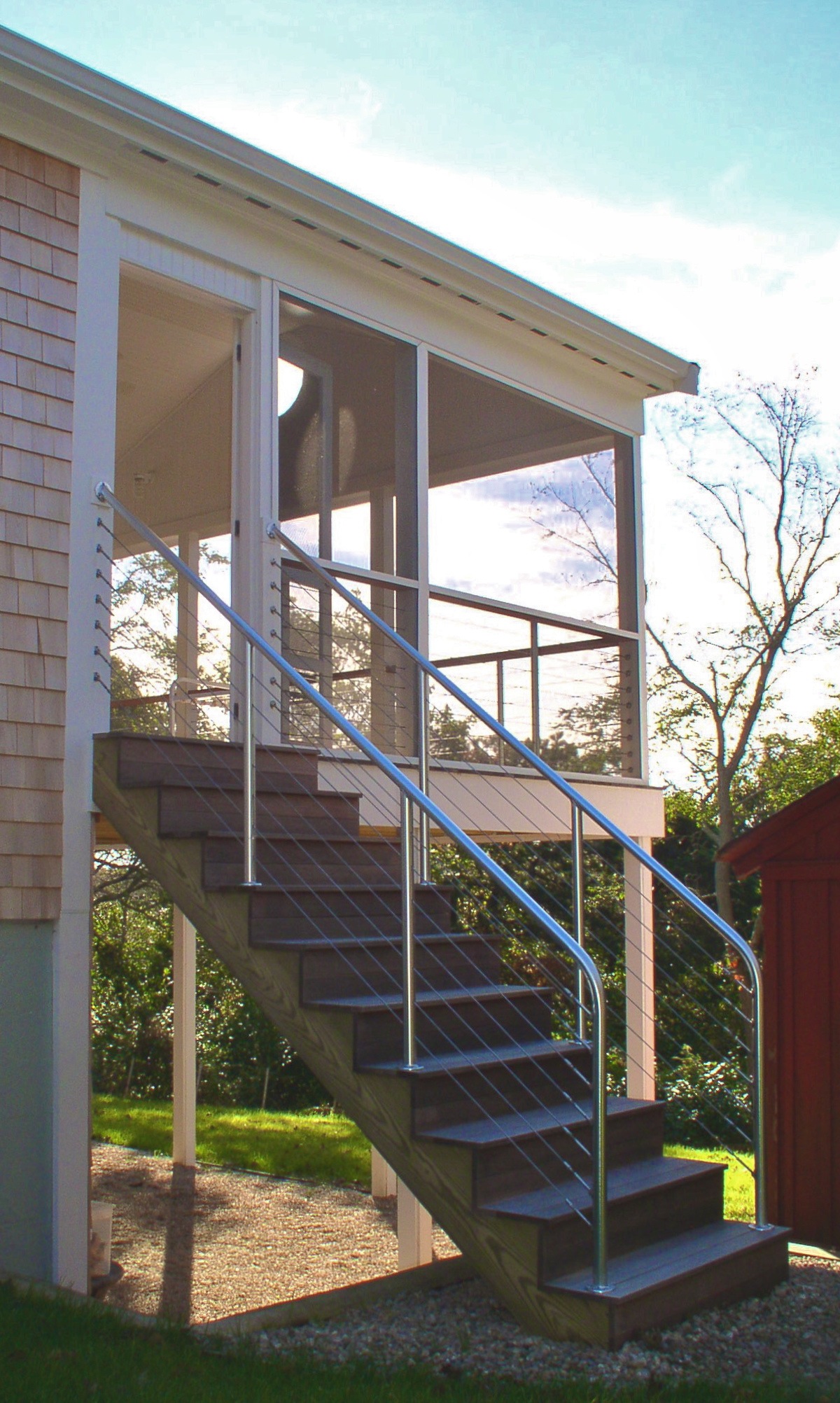 Stair with cable rails by Duxbury design/build firm